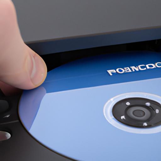 A person trying to insert a PS5 disc into a PS4 console, unaware of the incompatibility